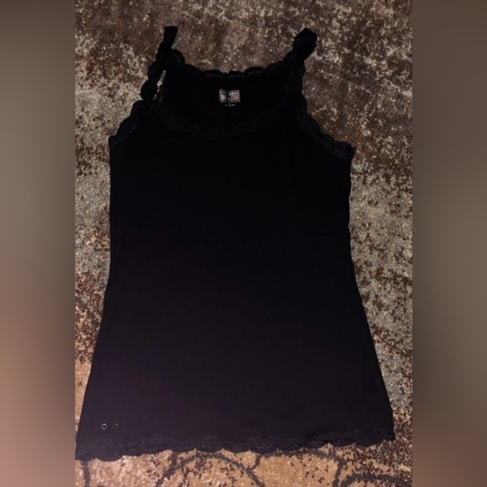 3 tank tops all fit the same 2 black and 1‎ green